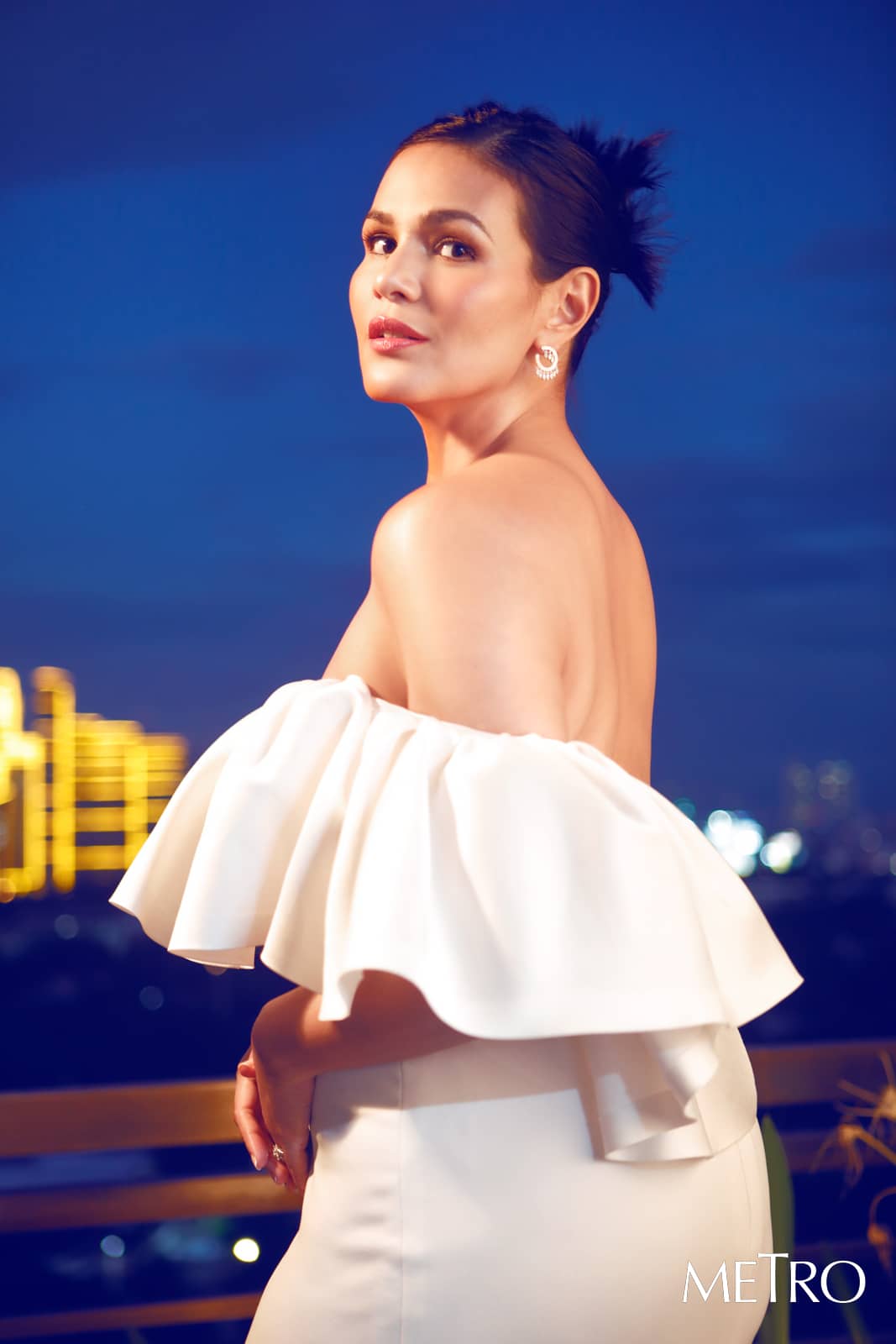 Sleeveless cape dress by Tantease; Satin sandals by Giuseppe Zanotti; Gold necklace by JJ Jiao